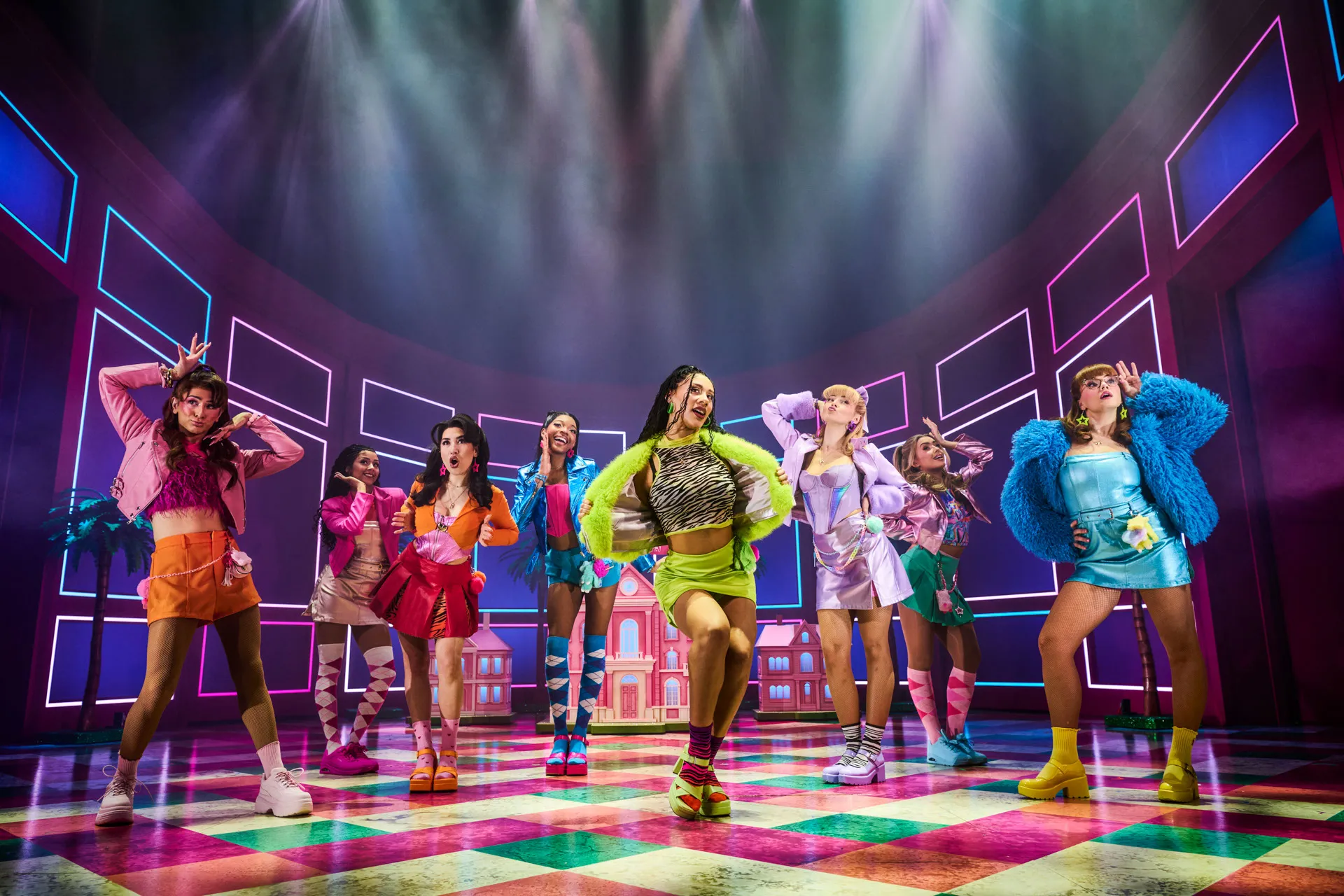 The Delta Nu sorority sisters pose in neon pink and blue outfits in Legally Blonde The Musical